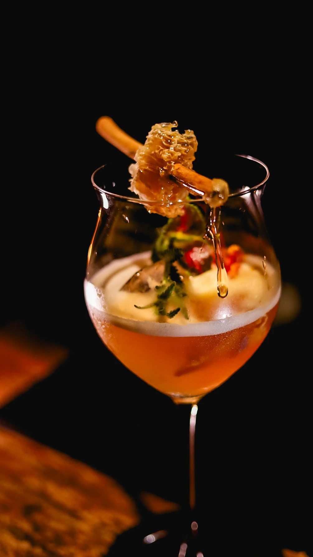 A signature cocktail with an intricate garnish